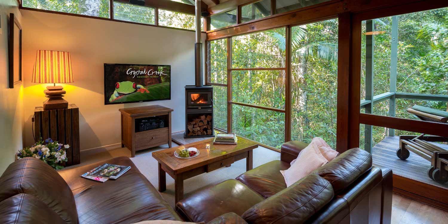 A Creekside Spa Cabin is a cosy romantic getaway enclosed by the rainforest, within earshot of the creek itself. Click or tap to read more about this accommodation type.